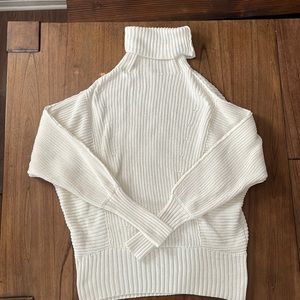Free People oversized white turtleneck.